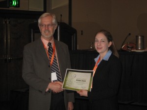 Awardee Kristin Sonon with President Charles Vorhees